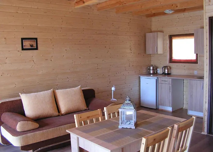 Деревянный коттедж Bursztynowy Zakatek Янтар