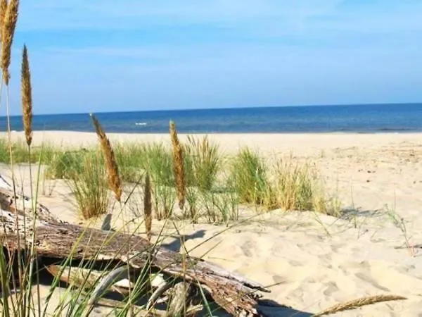 Деревянный коттедж Bursztynowy Zakatek Янтар