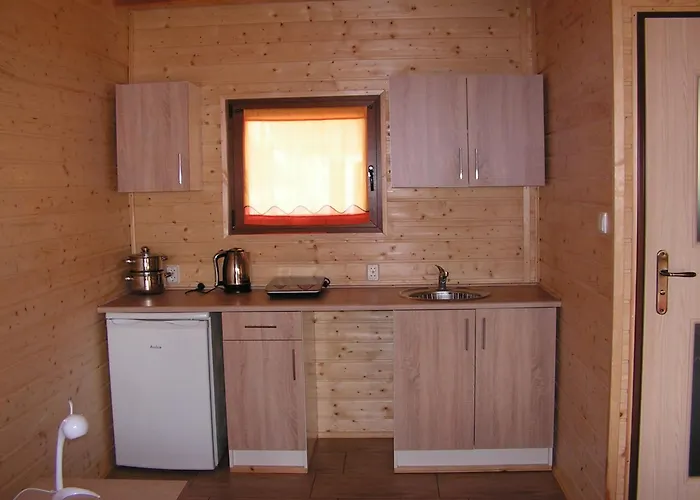 Деревянный коттедж Bursztynowy Zakatek Янтар